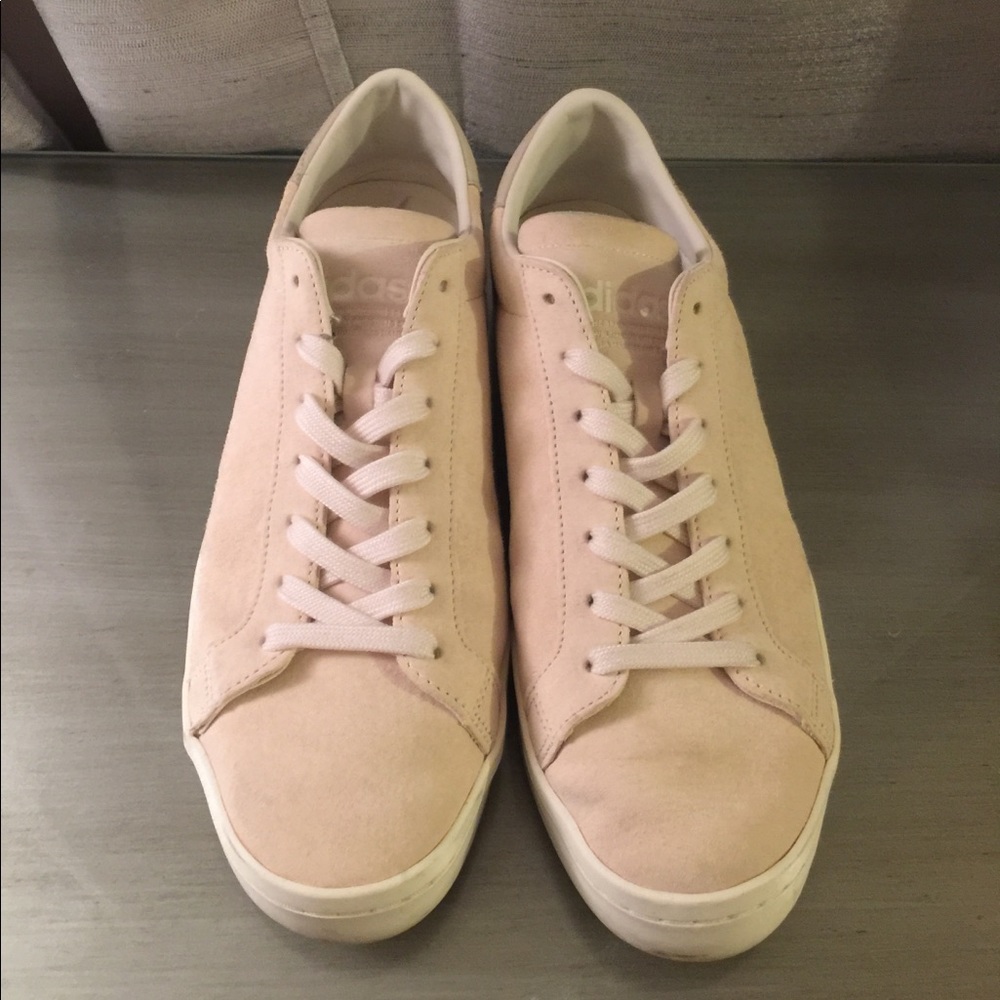 Cream color Adidas shoes. Size 10